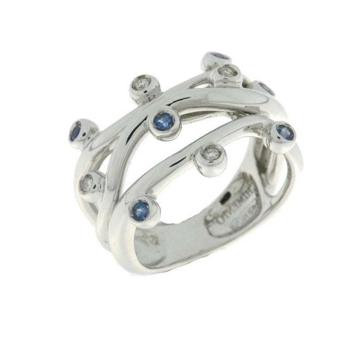 Anillo oro blanco 18 Ktes. con cuatro diamantes talla